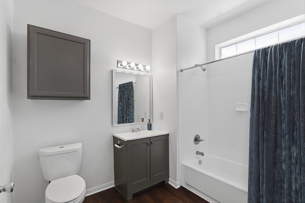 Bathroom with sink and toilet at Almeda Park Apartments in Houston TX